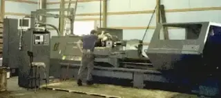 The AMC Software owner in 1993 running a Fagor controls retro-fit LeBlond lathe with a 36inch diameter swing and 12foot bed